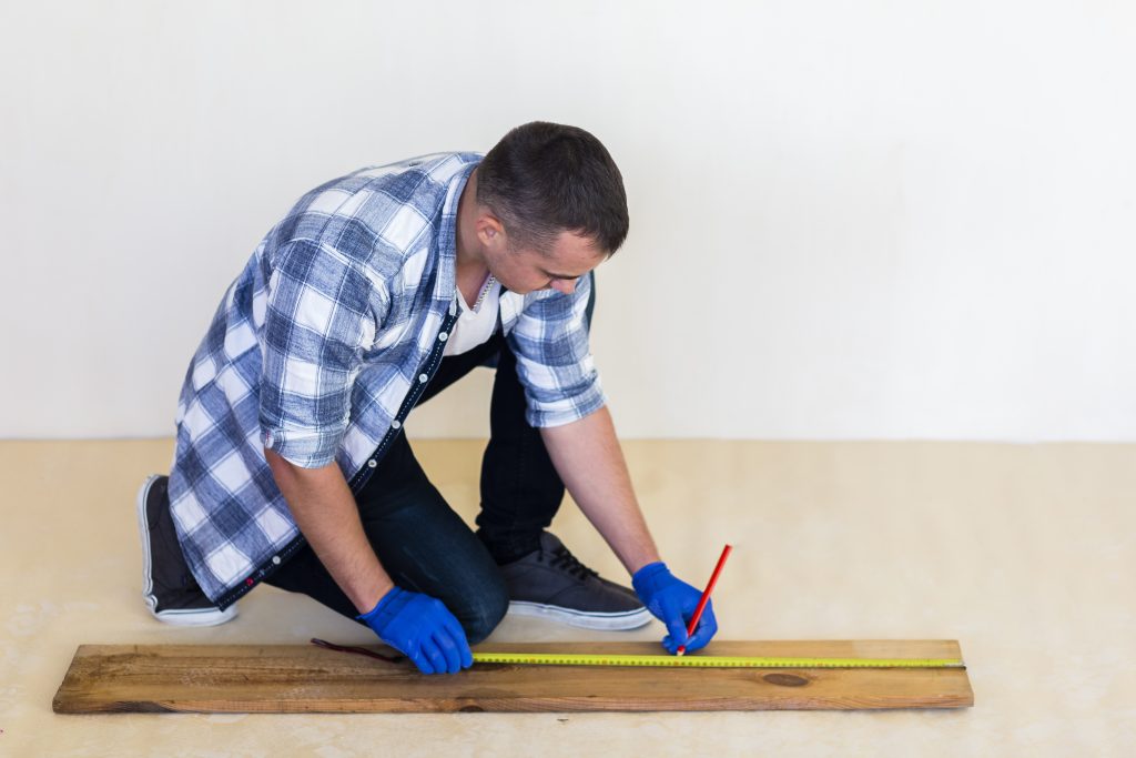 Parquetry flooring installation relies on precision cutting to achieve seamless patterns and a high-end, flawless finish.