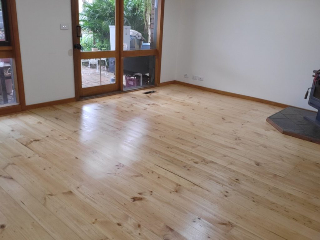 Pine floorboards finished with a Bona water based matt coating in a Wantirna bedroom